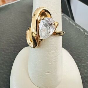 Gold Pear-Cut Solitaire Ring with Clear Stone engagement ring: